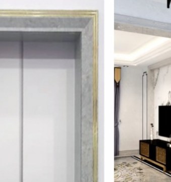 A grey marble-effect surround to a lift and a doorway