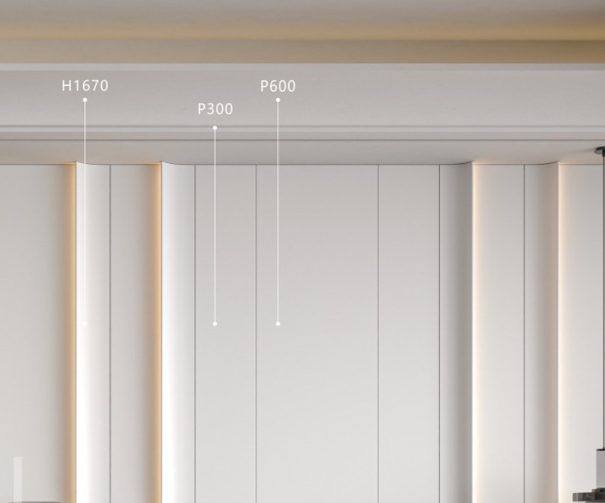 A bedroom wall with concealed light in the vertical sections either side